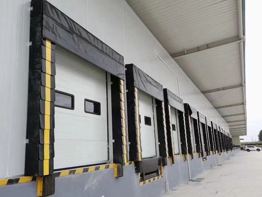 Porte sezionali coibentate in acciaio per garage industriali 380V automatiche telecomandate
