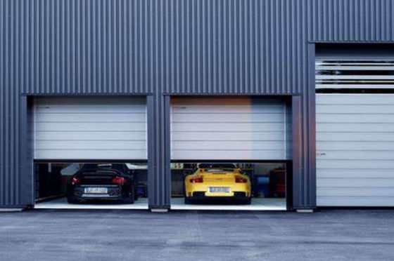 Porta a spirale a velocità controllata da PLC per una maggiore sicurezza Velocità di apertura veloce per parcheggi sotterranei