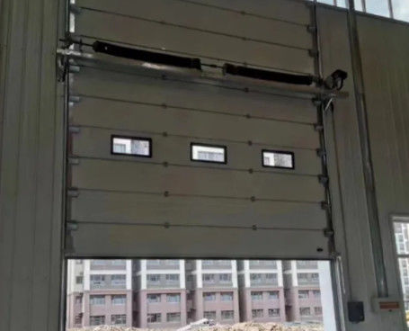 Porte di garage commerciali isolanti di acciaio grigio