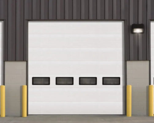 Porte sezionali industriali per stazioni di vigili del fuoco con tecnologia a forma automatica e resistente al vento