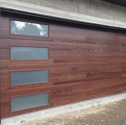 Porta aerea sezionale di magazzino con isolamento di spessore 50 mm-80 mm e finitura rivestita in polvere