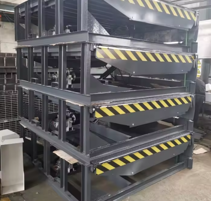 Piattaforma di sollevamento per carico container con rampa idraulica regolabile per officina per livellatrici per porte di banchina da 6-20 tonnellate
