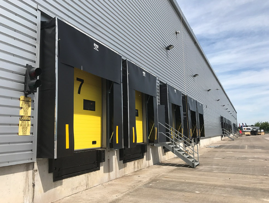 Protezione dagli elementi Sistema di carico regolabile Riparo per porta di banchina Baia di carico logistico per celle frigorifere con isolamento termico personalizzato industriale