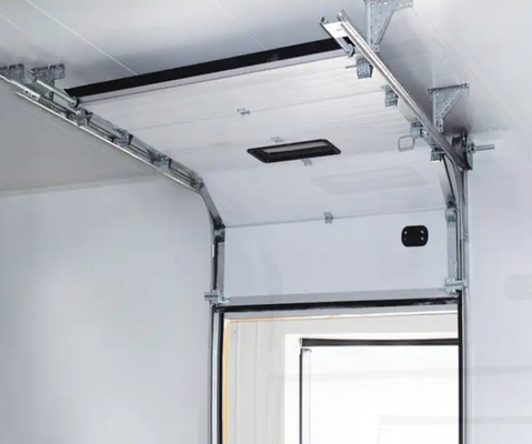 Porte sezionali commerciali insonorizzate per caserme dei pompieri Porte sezionali industriali Porte sezionali in acciaio formate automaticamente