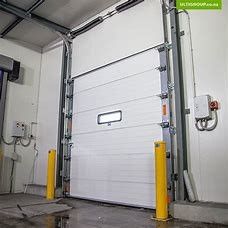 Il colore di Sandwitch ha isolato il pannello sopraelevato commerciale delle porte sezionali del garage
