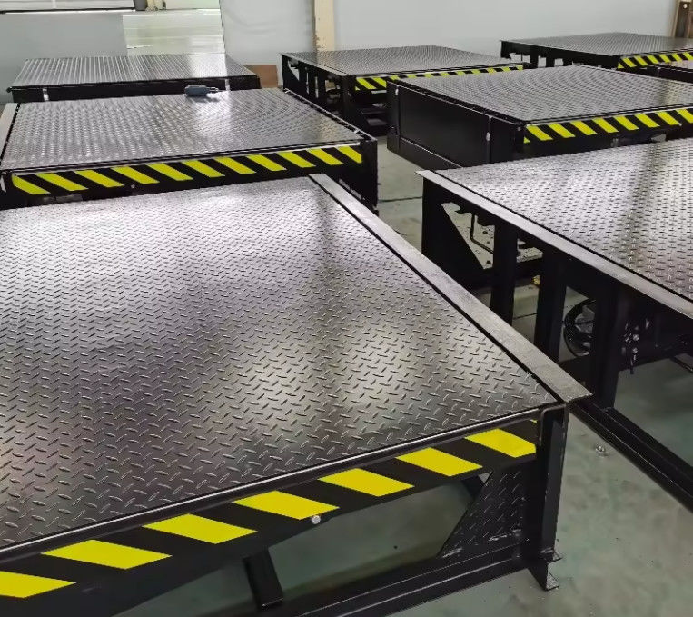 Livellatore di stazione di carico in polvere/galvanizzato con catene di sicurezza e telecomandi manuali