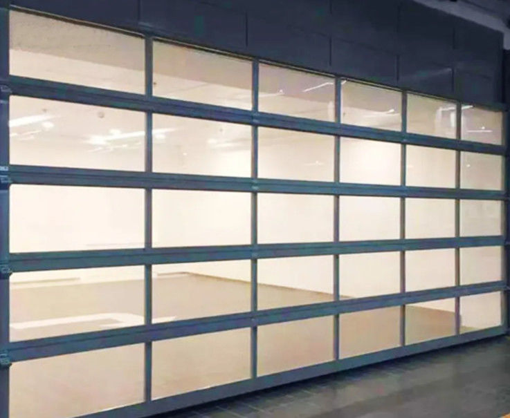 Moderno stile di design resistenza all'acqua classe 3 vetro trasparente porta di garage sezionale con isolamento acustico
